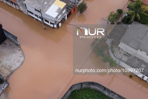 Intense rain is causing disruption in the cities of Carapicuiba and Itapevi, in Sao Paulo, Brazil, on April 13, 2023, leading to several poi...