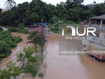 Intense rain is causing disruption in the cities of Carapicuiba and Itapevi, in Sao Paulo, Brazil, on April 13, 2023, leading to several poi...