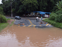 Intense rain is causing disruption in the cities of Carapicuiba and Itapevi, in Sao Paulo, Brazil, on April 13, 2023, leading to several poi...