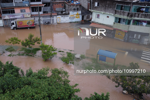 Intense rain is causing disruption in the cities of Carapicuiba and Itapevi, in Sao Paulo, Brazil, on April 13, 2023, leading to several poi...