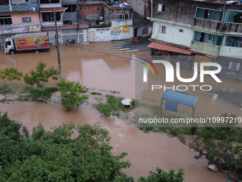 Intense rain is causing disruption in the cities of Carapicuiba and Itapevi, in Sao Paulo, Brazil, on April 13, 2023, leading to several poi...