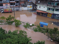 Intense rain is causing disruption in the cities of Carapicuiba and Itapevi, in Sao Paulo, Brazil, on April 13, 2023, leading to several poi...