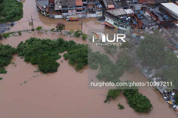 Intense rain is causing disruption in the cities of Carapicuiba and Itapevi, in Sao Paulo, Brazil, on April 13, 2023, leading to several poi...