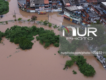 Intense rain is causing disruption in the cities of Carapicuiba and Itapevi, in Sao Paulo, Brazil, on April 13, 2023, leading to several poi...