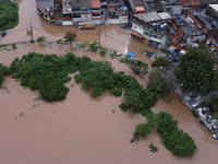 Intense rain is causing disruption in the cities of Carapicuiba and Itapevi, in Sao Paulo, Brazil, on April 13, 2023, leading to several poi...