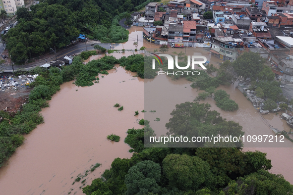 Intense rain is causing disruption in the cities of Carapicuiba and Itapevi, in Sao Paulo, Brazil, on April 13, 2023, leading to several poi...