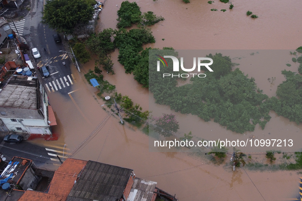 Intense rain is causing disruption in the cities of Carapicuiba and Itapevi, in Sao Paulo, Brazil, on April 13, 2023, leading to several poi...