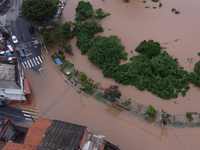 Intense rain is causing disruption in the cities of Carapicuiba and Itapevi, in Sao Paulo, Brazil, on April 13, 2023, leading to several poi...