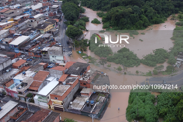 Intense rain is causing disruption in the cities of Carapicuiba and Itapevi, in Sao Paulo, Brazil, on April 13, 2023, leading to several poi...