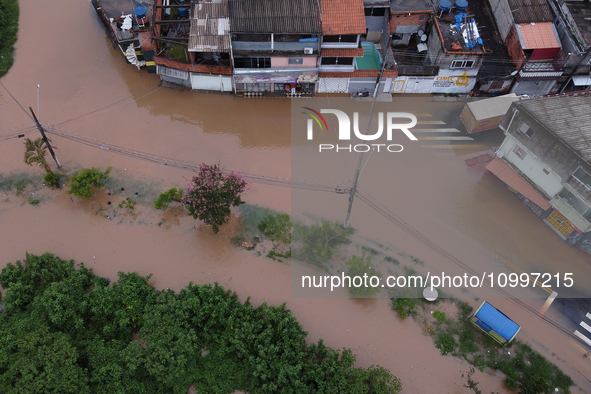 Intense rain is causing disruption in the cities of Carapicuiba and Itapevi, in Sao Paulo, Brazil, on April 13, 2023, leading to several poi...