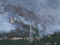 Smoke is rising from a vegetation fire in Port Hills, Canterbury region, New Zealand, on February 15, 2024. (