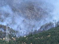 Smoke is rising from a vegetation fire in Port Hills, Canterbury region, New Zealand, on February 15, 2024. (