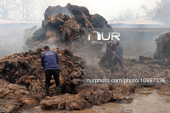 Firefighters are extinguishing a fire that has broken out at a Jute Corporation of India godown in the Bhuragaon area of Morigaon district,...