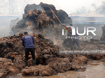 Firefighters are extinguishing a fire that has broken out at a Jute Corporation of India godown in the Bhuragaon area of Morigaon district,...