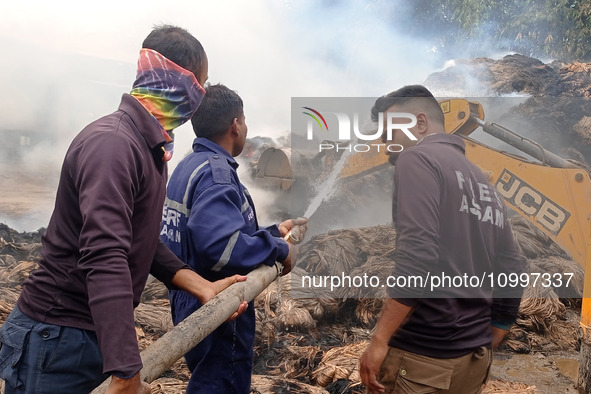 Firefighters are extinguishing a fire that has broken out at a Jute Corporation of India godown in the Bhuragaon area of Morigaon district,...