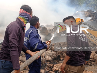 Firefighters are extinguishing a fire that has broken out at a Jute Corporation of India godown in the Bhuragaon area of Morigaon district,...