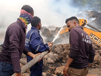 Firefighters are extinguishing a fire that has broken out at a Jute Corporation of India godown in the Bhuragaon area of Morigaon district,...