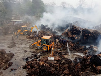 Firefighters are using JCB machines to extinguish a fire that has broken out at a Jute Corporation of India godown in the Bhuragaon area of...