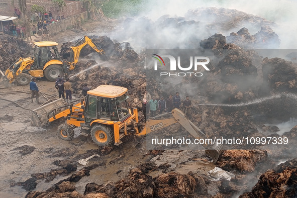 Firefighters are using JCB machines to extinguish a fire that has broken out at a Jute Corporation of India godown in the Bhuragaon area of...