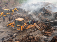 Firefighters are using JCB machines to extinguish a fire that has broken out at a Jute Corporation of India godown in the Bhuragaon area of...