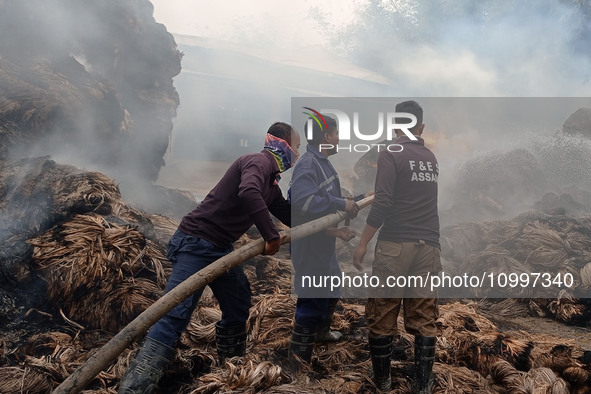 Firefighters are extinguishing a fire that has broken out at a Jute Corporation of India godown in the Bhuragaon area of Morigaon district,...