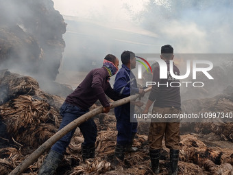 Firefighters are extinguishing a fire that has broken out at a Jute Corporation of India godown in the Bhuragaon area of Morigaon district,...