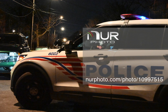 Law enforcement is present on Hanna Place Southeast in Washington, DC, United States, on February 15, 2024. Police are on the scene with an...