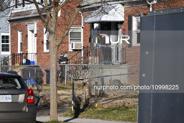 Investigators are searching a residence and gathering evidence on Hanna Place Southeast in Washington, DC, United States, on February 15, 20...