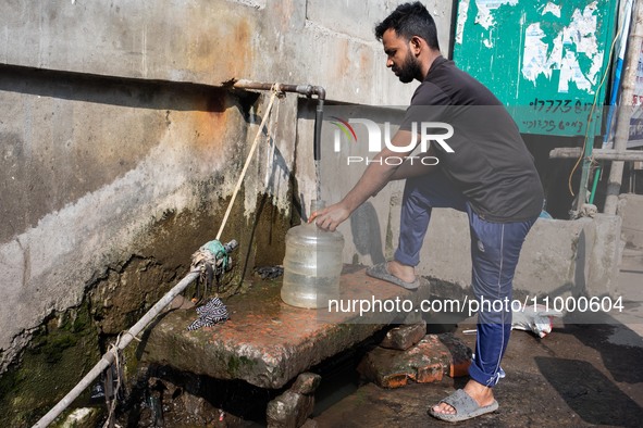 A Man Collects Drinking Water From A Local Deep Water Tap At Sayedabad In Dhaka, Bangladesh On February 16, 2024. Locals Said That The Water...