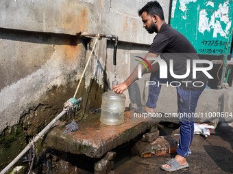 A Man Collects Drinking Water From A Local Deep Water Tap At Sayedabad In Dhaka, Bangladesh On February 16, 2024. Locals Said That The Water...