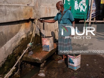 A Man Collects Drinking Water From A Local Deep Water Tap At Sayedabad In Dhaka, Bangladesh On February 16, 2024. Locals Said That The Water...