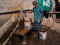 A Man Collects Drinking Water From A Local Deep Water Tap At Sayedabad In Dhaka, Bangladesh On February 16, 2024. Locals Said That The Water...