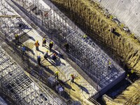 Workers are reinforcing the Yundong Gate at the construction site for the Subei Irrigation Canal in Huai'an, China, on February 16, 2024. (