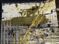 Workers are reinforcing the Yundong Gate at the construction site for the Subei Irrigation Canal in Huai'an, China, on February 16, 2024. (