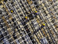 Workers are reinforcing the Yundong Gate at the construction site for the Subei Irrigation Canal in Huai'an, China, on February 16, 2024. (