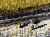 Workers are reinforcing the Yundong Gate at the construction site for the Subei Irrigation Canal in Huai'an, China, on February 16, 2024. (