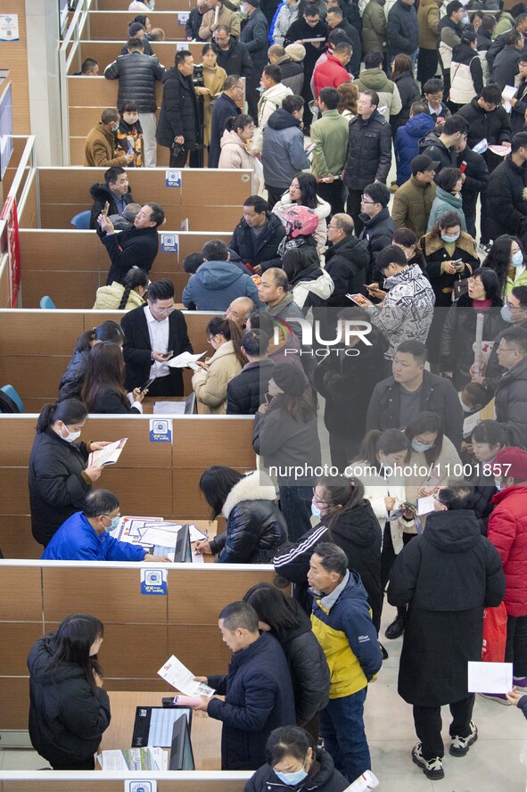 Job seekers are exchanging employment information with employers at the large-scale human resources trade fair in Haian, East China's Jiangs...