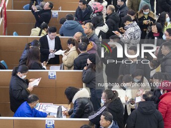 Job seekers are exchanging employment information with employers at the large-scale human resources trade fair in Haian, East China's Jiangs...