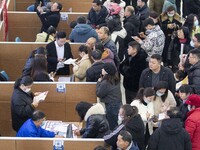 Job seekers are exchanging employment information with employers at the large-scale human resources trade fair in Haian, East China's Jiangs...