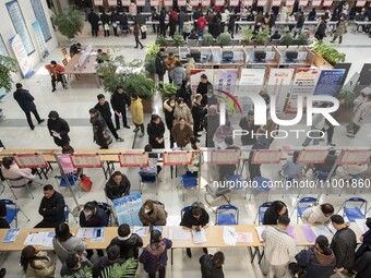 Job seekers are exchanging employment information with employers at the large-scale human resources trade fair in Haian, East China's Jiangs...