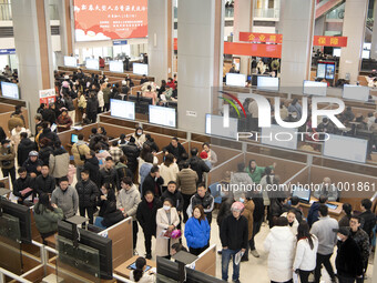 Job seekers are exchanging employment information with employers at the large-scale human resources trade fair in Haian, East China's Jiangs...