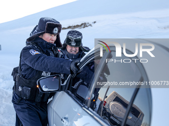 Border police are rescuing a stranded vehicle in Altay, Xinjiang province, China, on February 18, 2024, as the lowest temperature reaches -5...