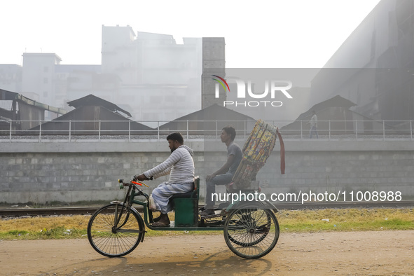 Smoke is rising from a re-rolling mill, polluting the air in Dhaka, Bangladesh, on February 19, 2024. 