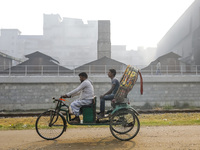 Smoke is rising from a re-rolling mill, polluting the air in Dhaka, Bangladesh, on February 19, 2024. (