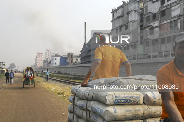 Smoke is rising from a re-rolling mill, polluting the air in Dhaka, Bangladesh, on February 19, 2024. 