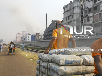 Smoke is rising from a re-rolling mill, polluting the air in Dhaka, Bangladesh, on February 19, 2024. (