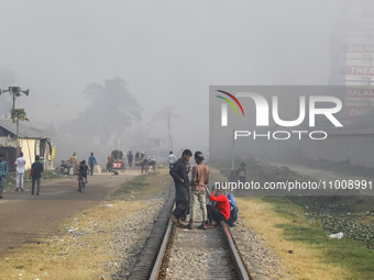 Smoke is rising from a re-rolling mill, polluting the air in Dhaka, Bangladesh, on February 19, 2024. (