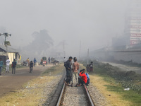 Smoke is rising from a re-rolling mill, polluting the air in Dhaka, Bangladesh, on February 19, 2024. (