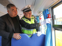 Police are conducting a safety check on a school bus at Erdu Primary School in Huzhou, China, on February 20, 2024. (