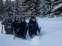 Border police are patrolling the border in heavy snow at -33 degrees Celsius in Altay, Xinjiang Province, China, on February 20, 2024. (